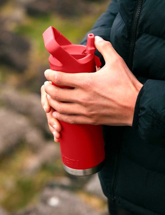 red straw bottle