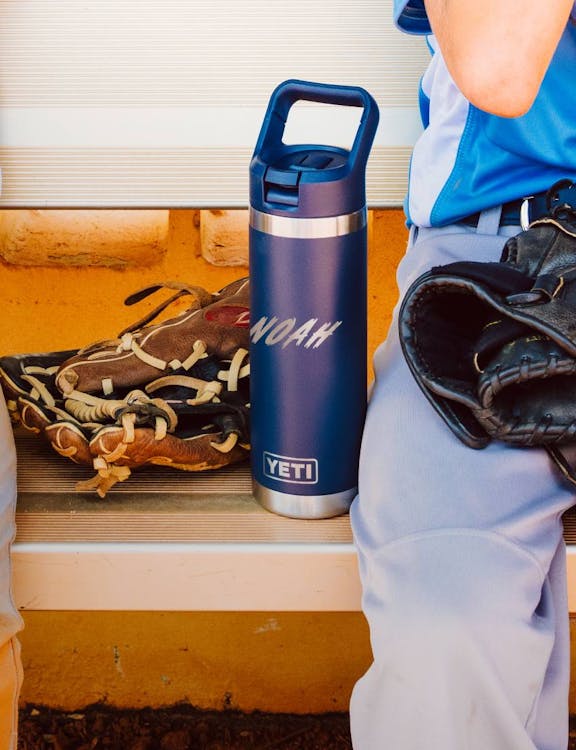 White Travel Bottle in Ranchero Backpack Side Pocket