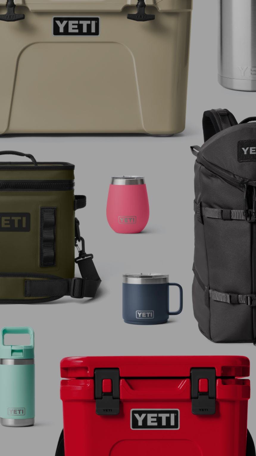 A collection of YETI products in various colors, including coolers, drinkware, and bags. The text reads 'EXPLORE BY COLOR. Stand out in bad weather or blend into the blind with a variety of core, new, and limited edition colors.