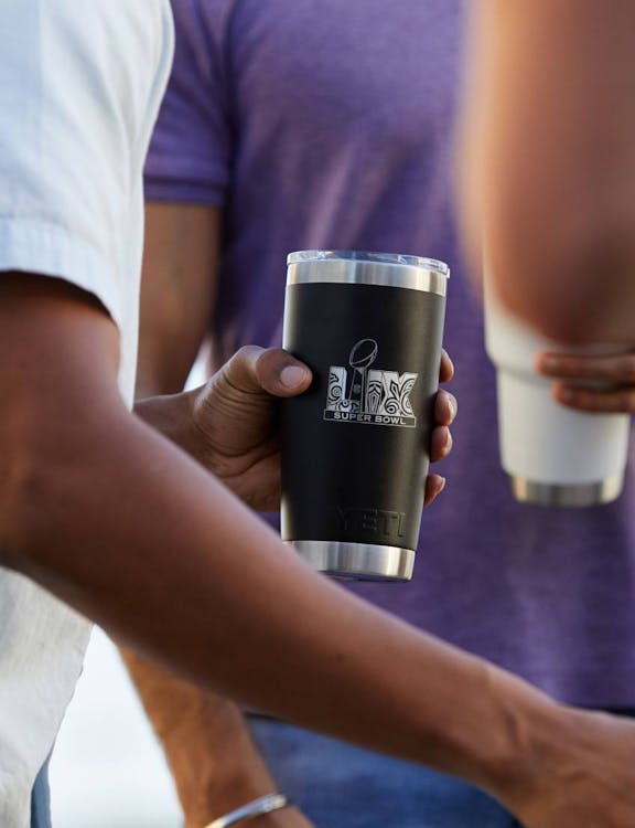 kansas city chiefs and philadelphia eagles custom logos on a tumbler and lowball