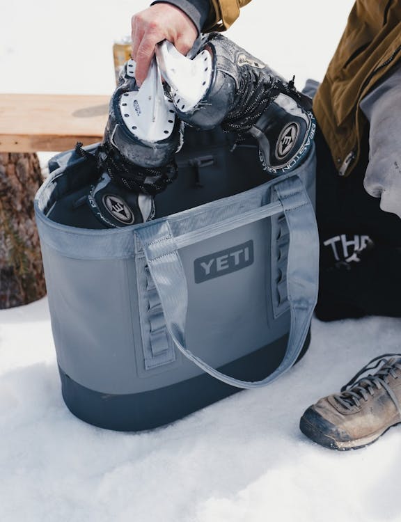 ice skates in tote bag