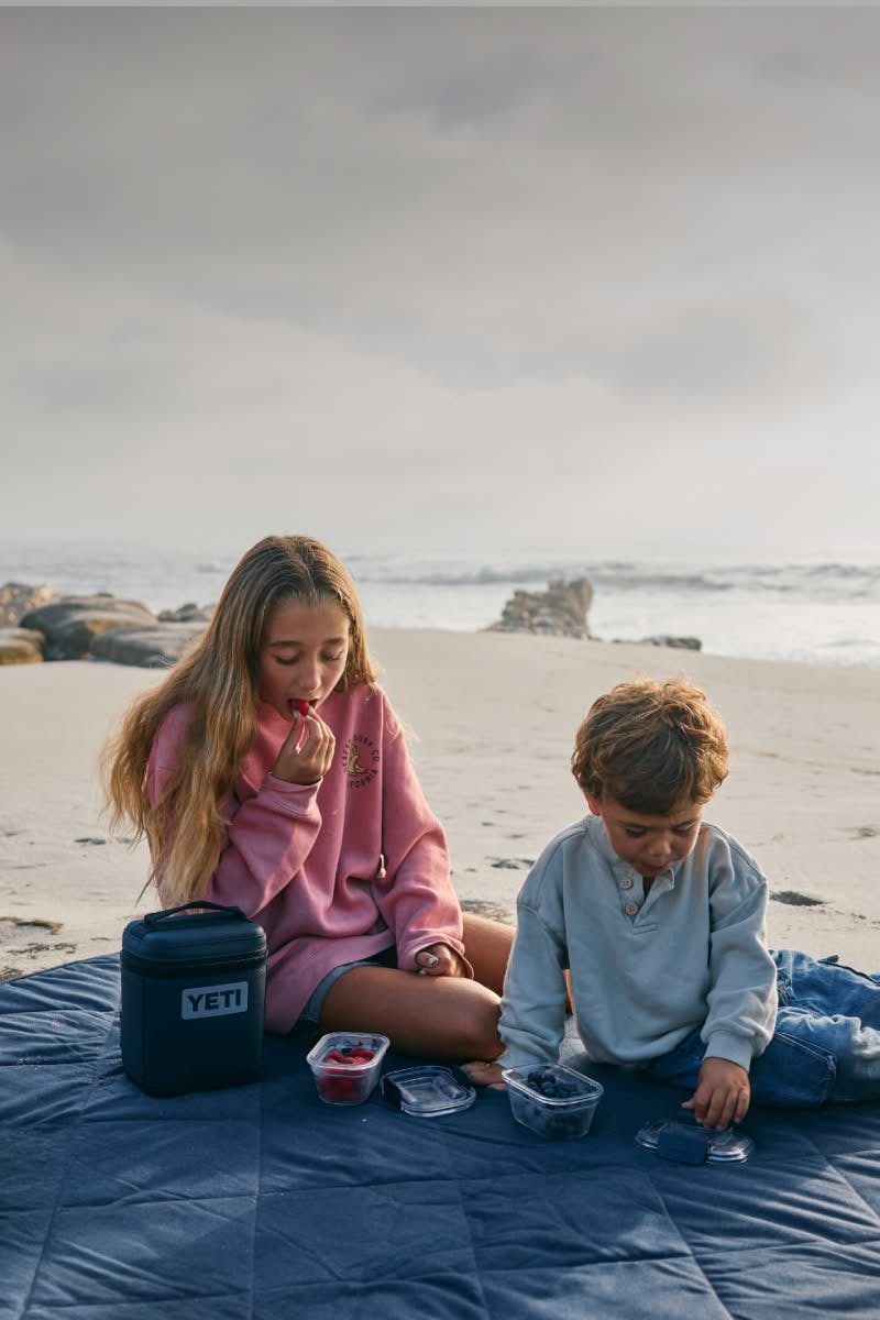 Lunch box over child's shoulder