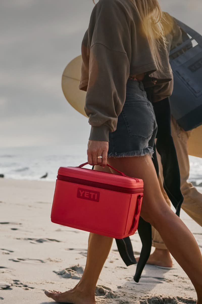 Lunch box over child's shoulder